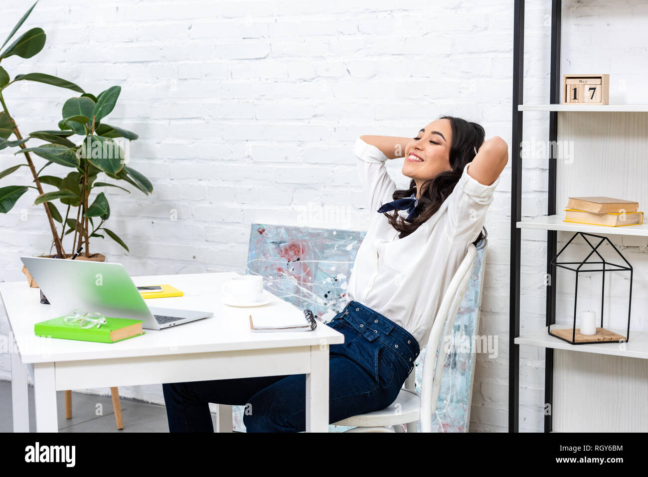 Leaning back on chair hires stock photography and images Alamy