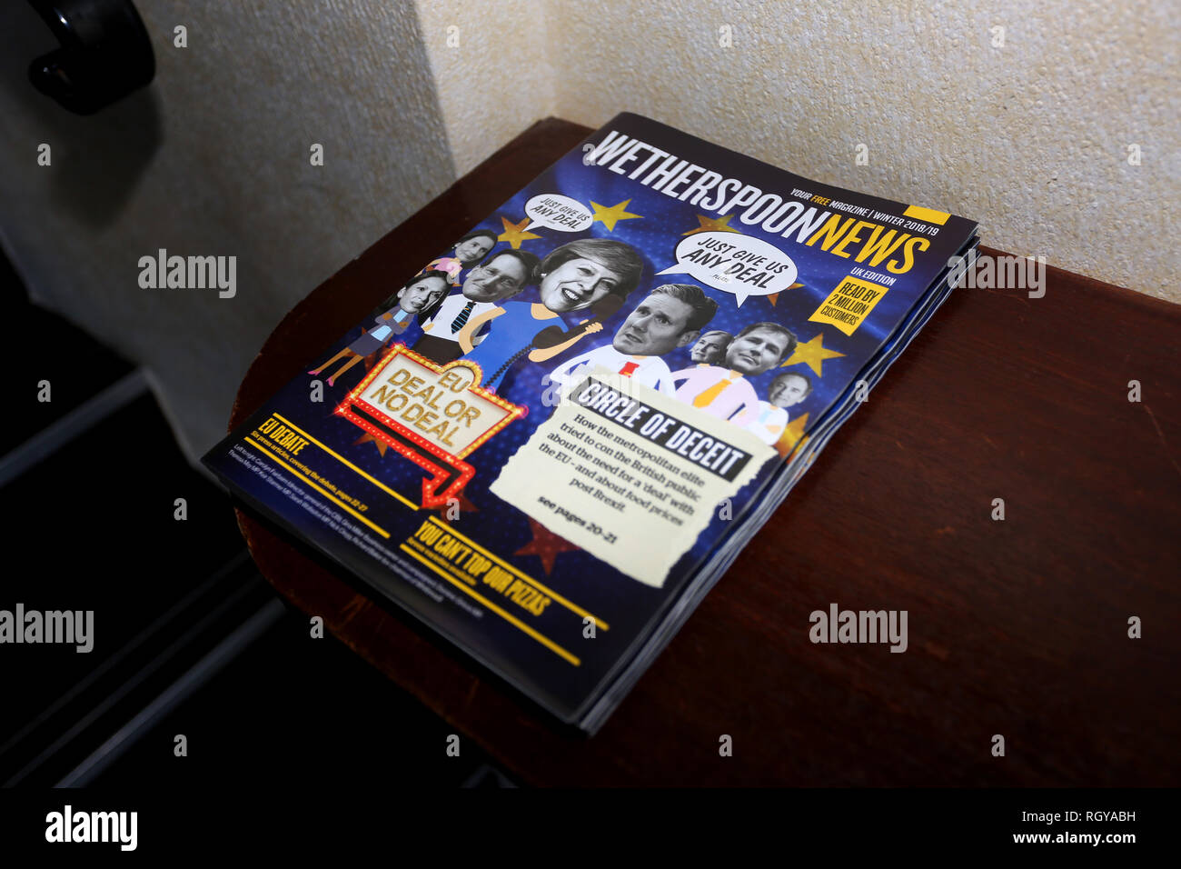 General view of a stack of Weatherspoon News magazines pictured in Bognor Regis, West Sussex, UK. Stock Photo