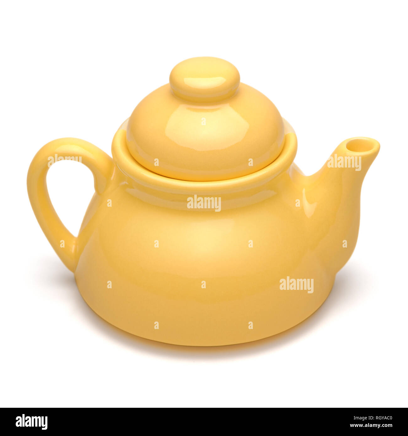 Isolated objects single small yellow teapot on white background Stock