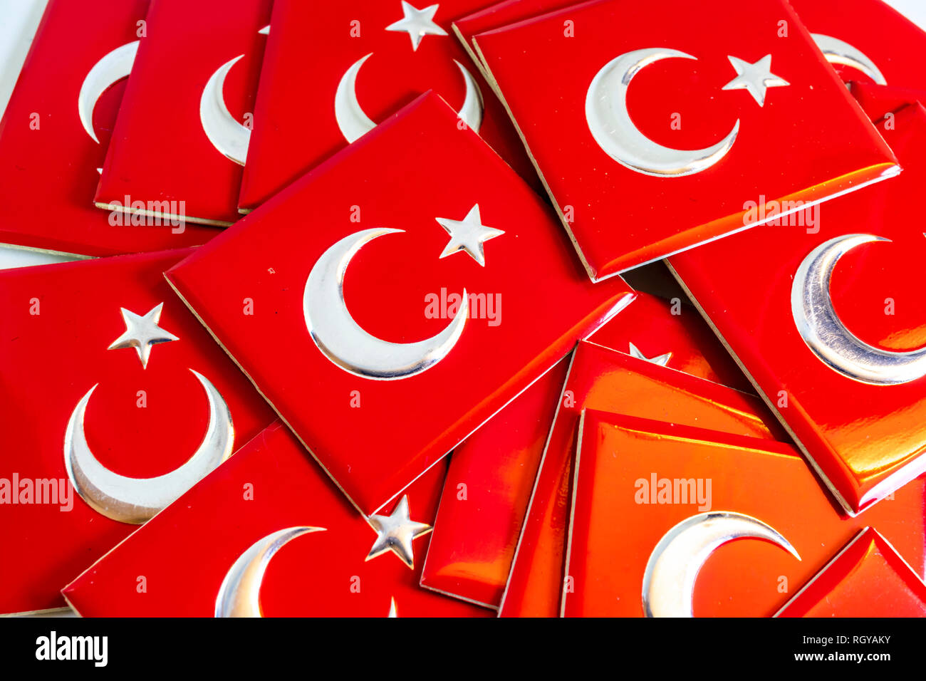 close up Turkish flag objects with moon and star on red color Stock