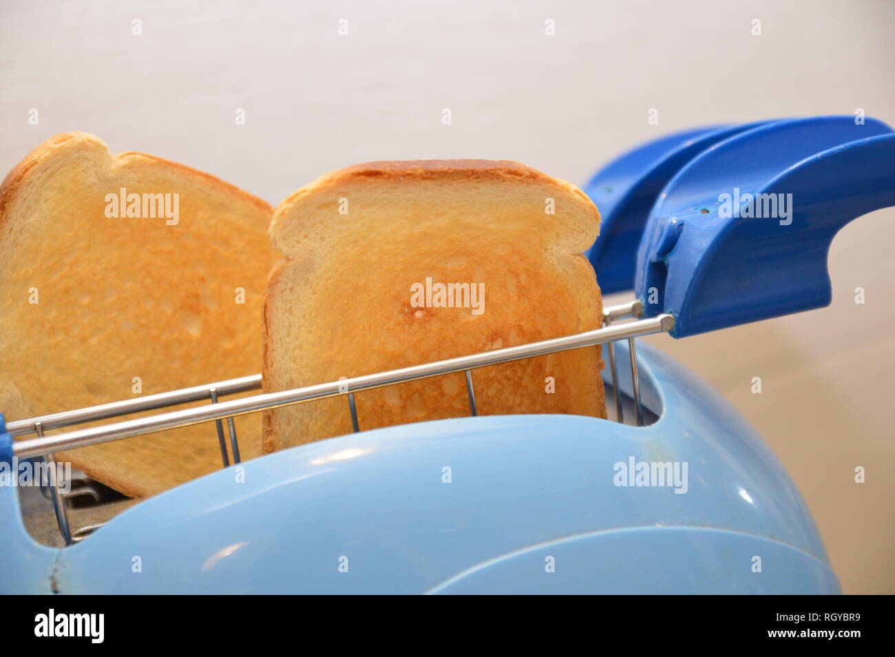 toasted bread in electric toasted machine Stock Photo Alamy