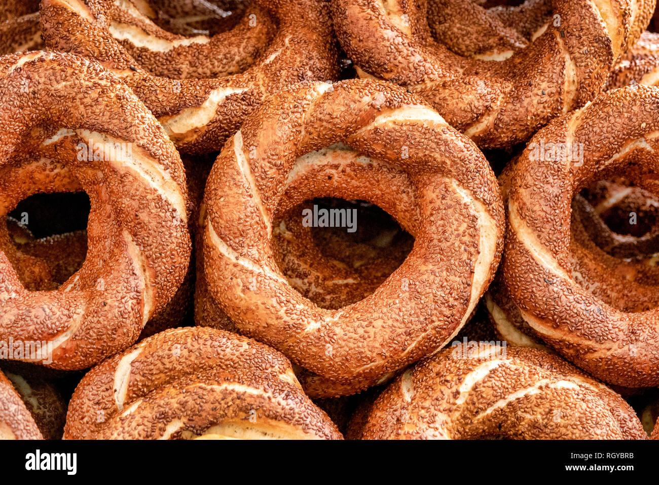 Simit, a circular bread, typically encrusted with sesame seeds found across the cuisines of the former Ottoman Empire. Stock Photo