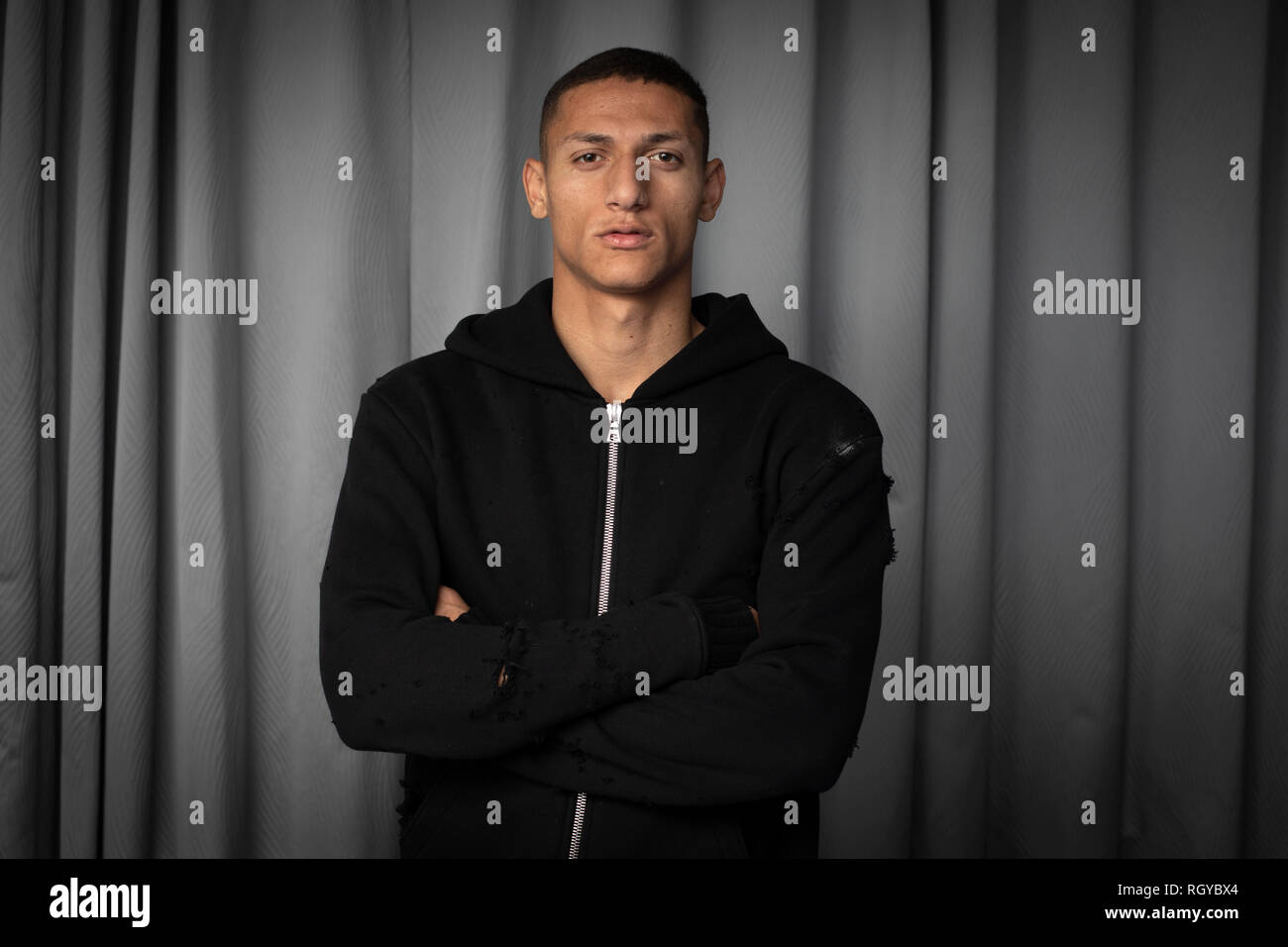 Everton footballer Richarlison, pictured at his home on Merseyside, which he shares with his agent Renato Velasco. The Brazilian forward joined Everton from Watford in 2018 and has already made his debut for the Brazil national team. He was due to play in his first Merseyside derby against Liverpool in three days time. Stock Photo