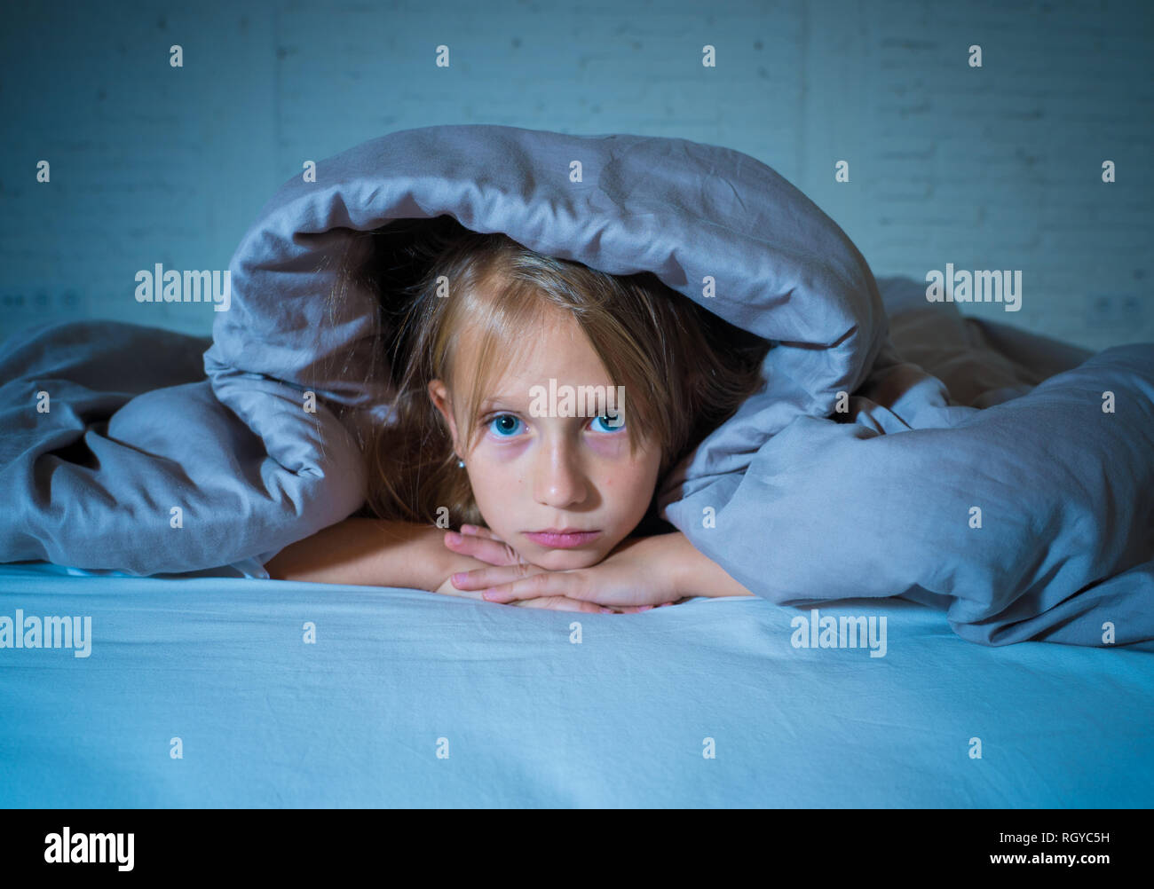 Child in bed night light hires stock photography and images Alamy