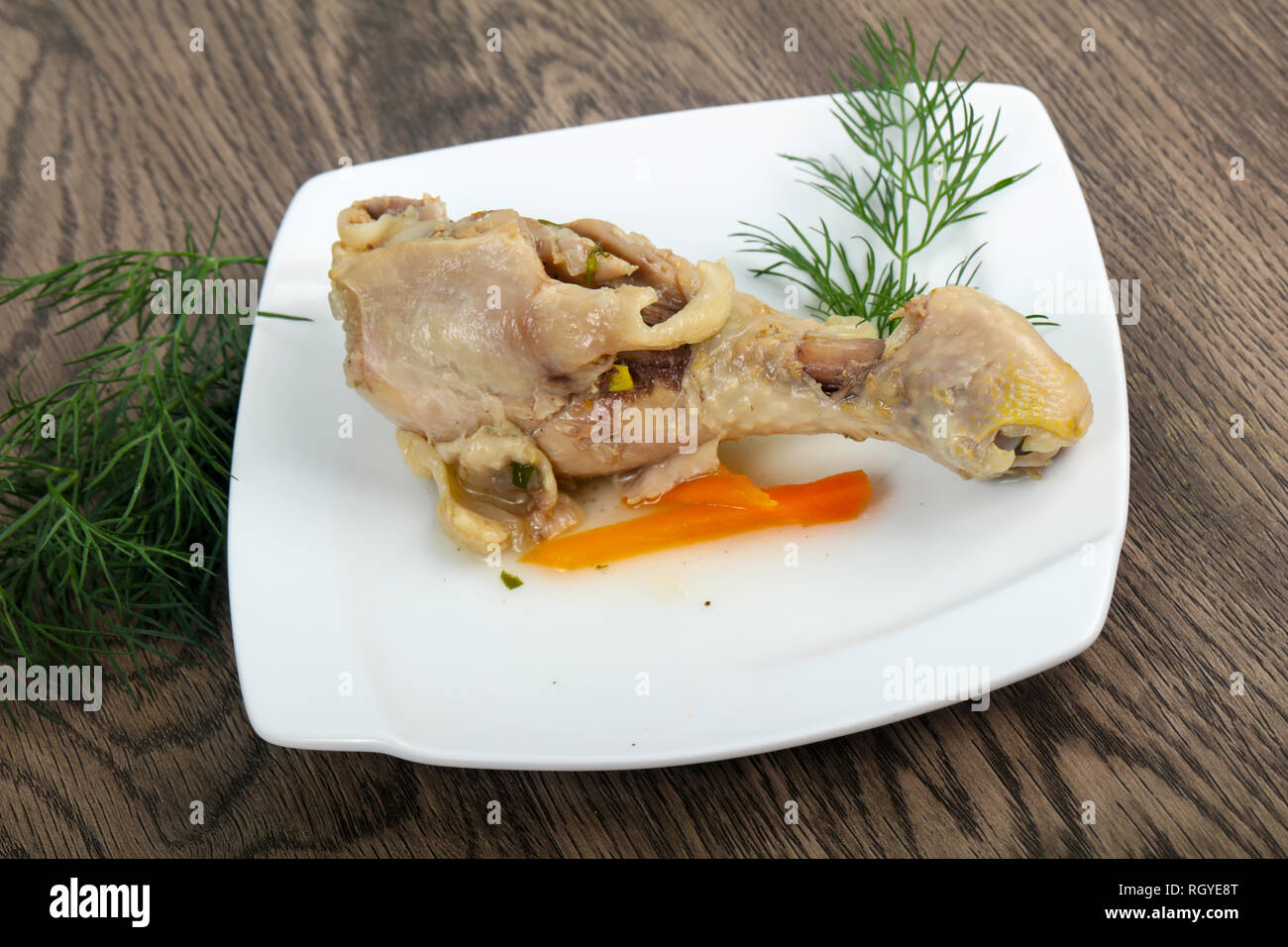 Boiled chicken leg served dill Stock Photo Alamy