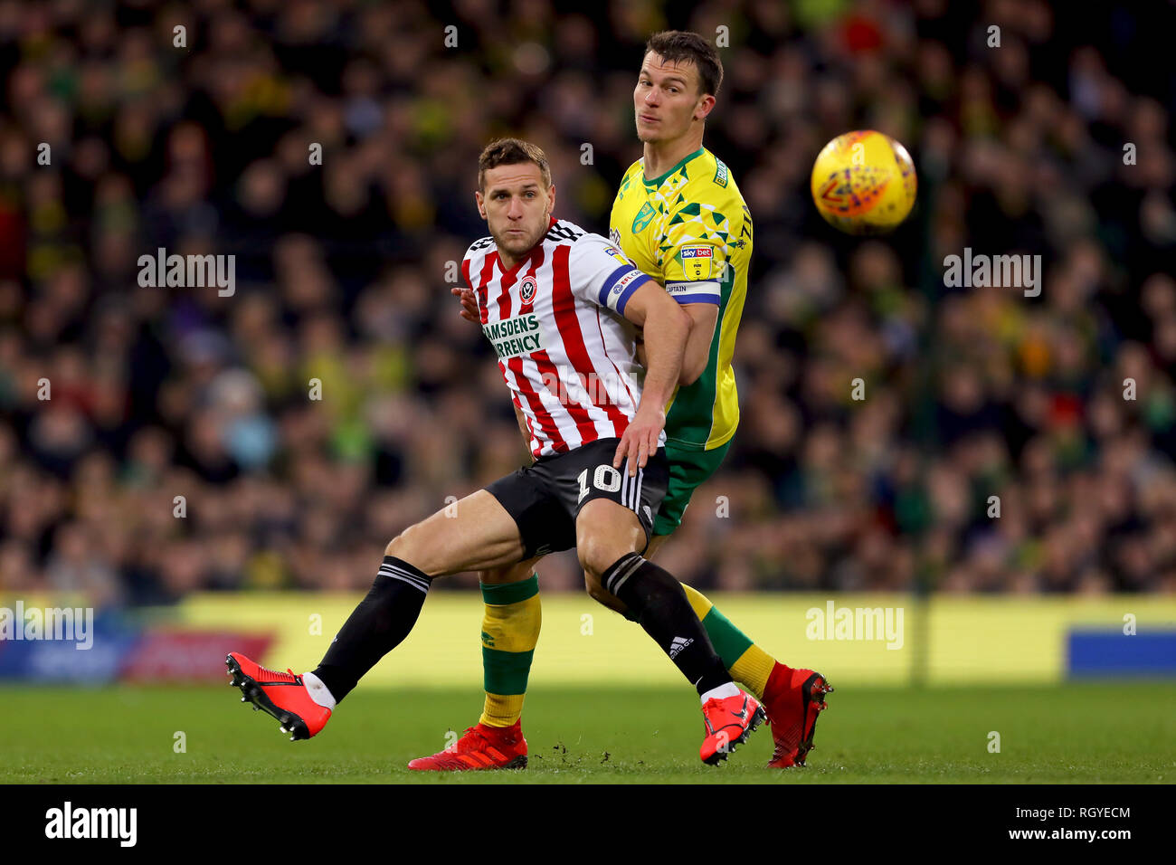 Christoph Zimmermann of Norwich City and Billy Sharp of Sheffield United battle for possession - Norwich City v Sheffield United, Sky Bet Championship Stock Photo