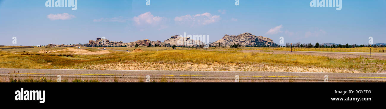 Buford, Wyoming, United States - August 15, 2018: Panoramic shot of the area surrounding 'Tree in the Rock' point of interest along interstate highway Stock Photo