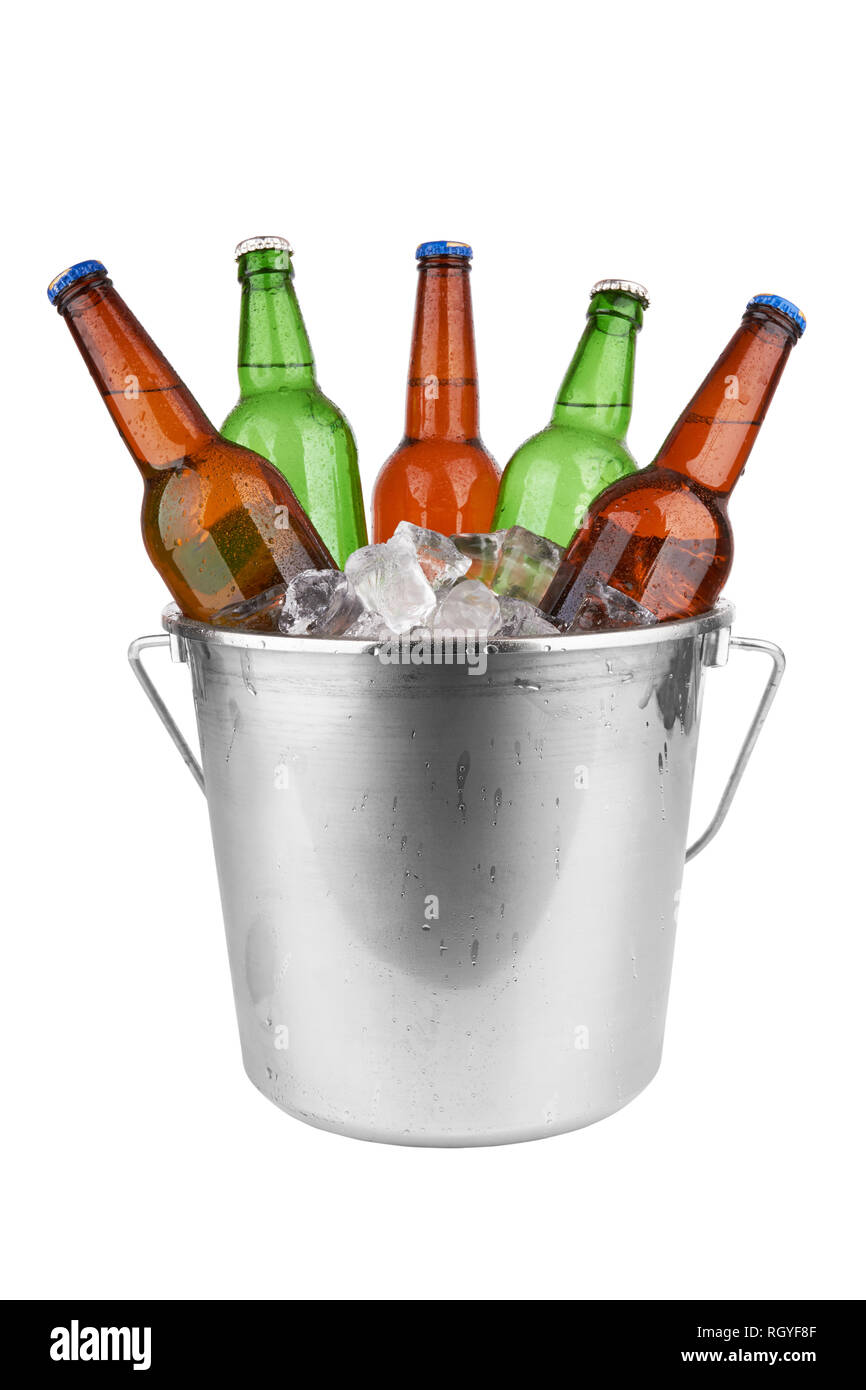 beer bottles in a bucket of ice isolated on a white background. Stock Photo