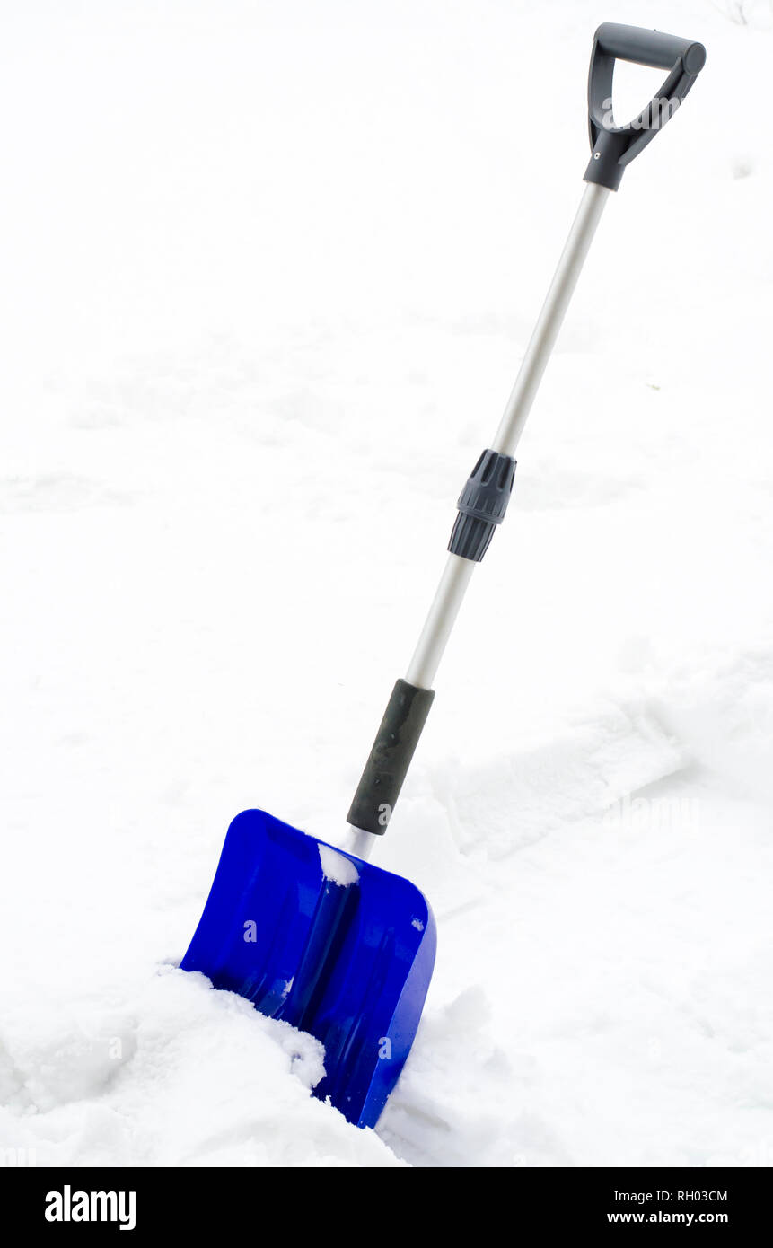Blue snow shovel hi-res stock photography and images - Alamy