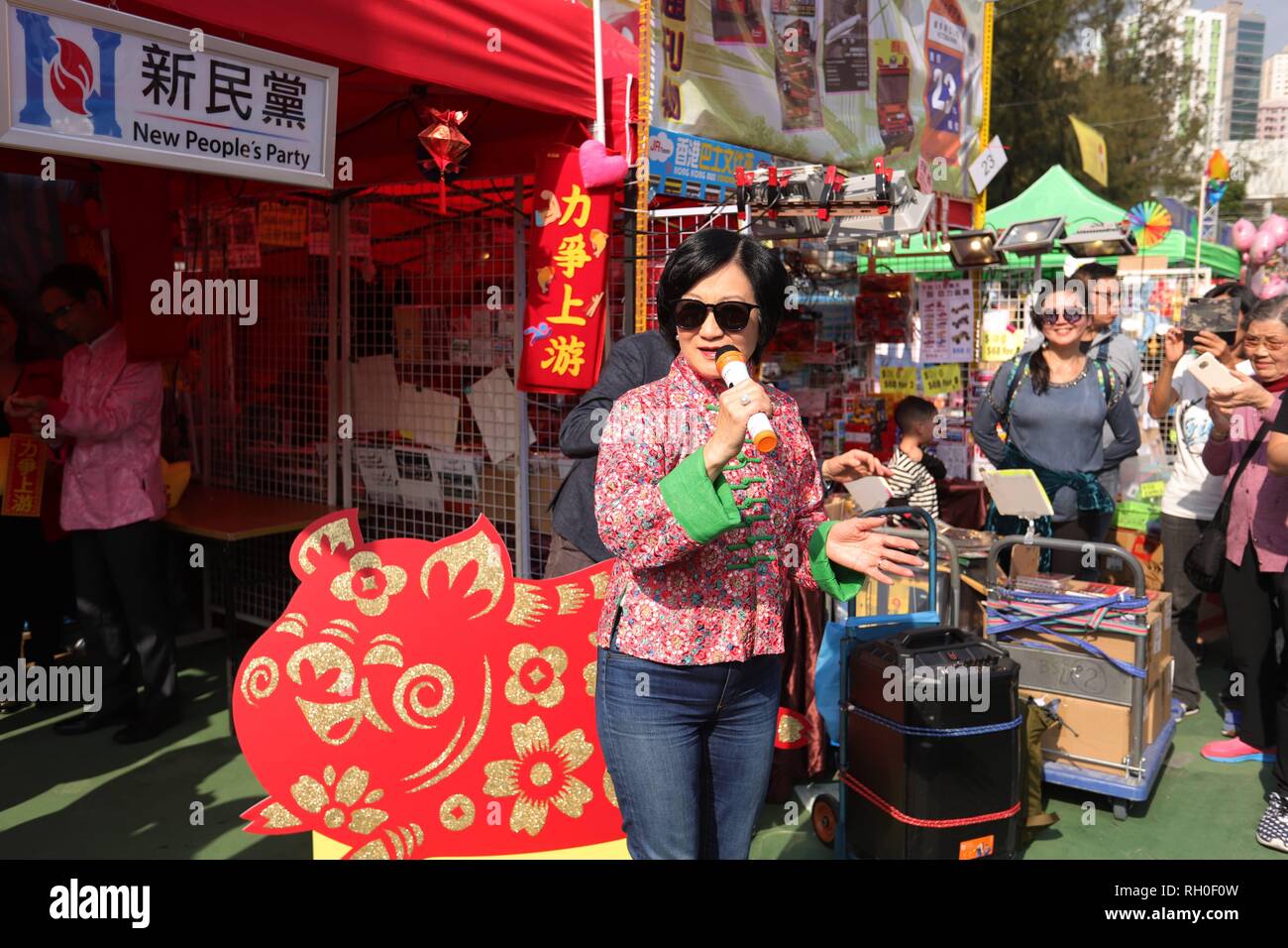 January 31, 2019 - Hong Kong, CHINA - Chairwoman of the NEW PEOPLES PARTY, Regina Ip speak to her supporters in front of Partys booth at the annual Lunar New Year Market.