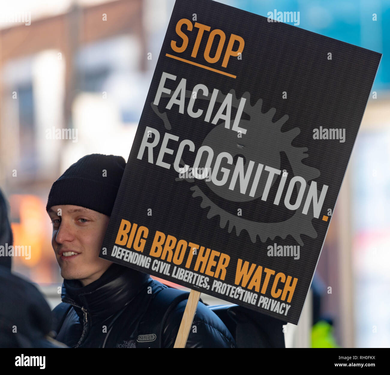 Romford, Essex, UK. 31st January 2019 Metropolitan Police trial live Facial recognition technology outside Romford Station. The police cameras scan passers by and check them against a 'watch list' in real time allowing them to apprehend any wanted people. A small number of protesters against the scheme protested outside Romford Station. Credit: Ian Davidson/Alamy Live News Stock Photo