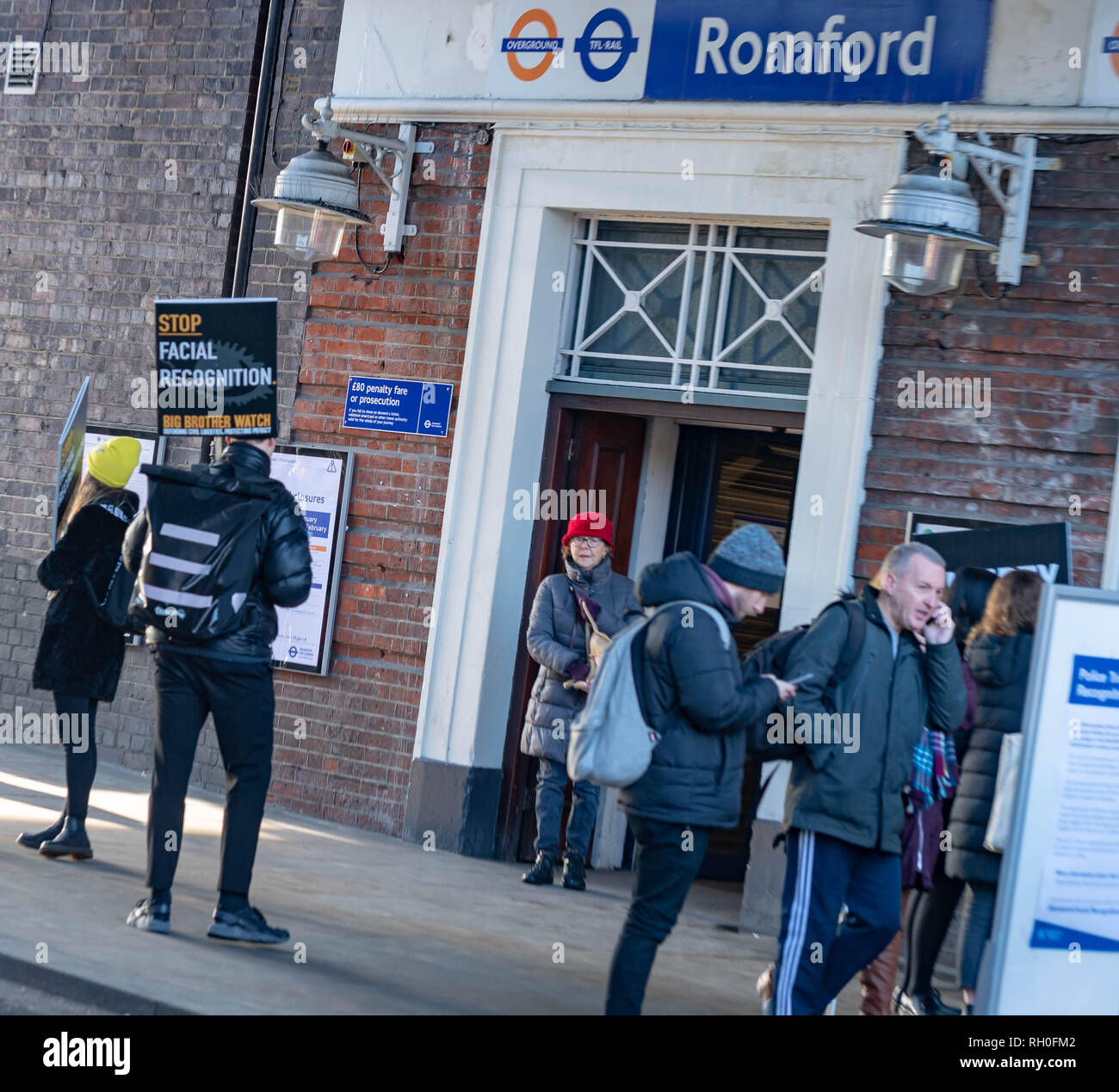 Romford, Essex, UK. 31st January 2019 Metropolitan Police trial live Facial recognition technology outside Romford Station. The police cameras scan passers by and check them against a 'watch list' in real time allowing them to apprehend any wanted people. A small number of protesters against the scheme protested outside Romford Station. Credit: Ian Davidson/Alamy Live News Stock Photo