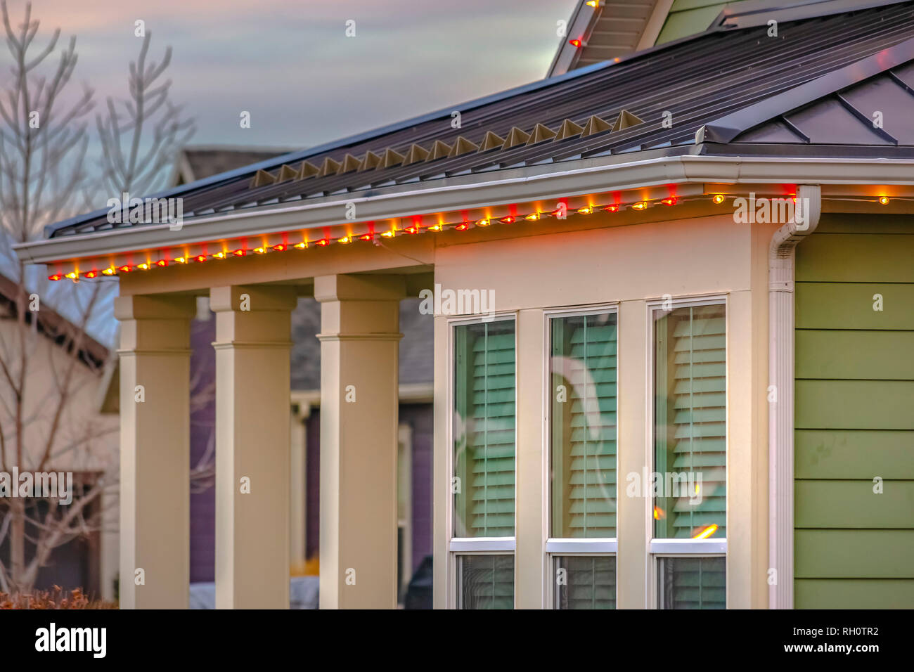Christmas lights framing the roof of home in Utah Stock Photo Alamy