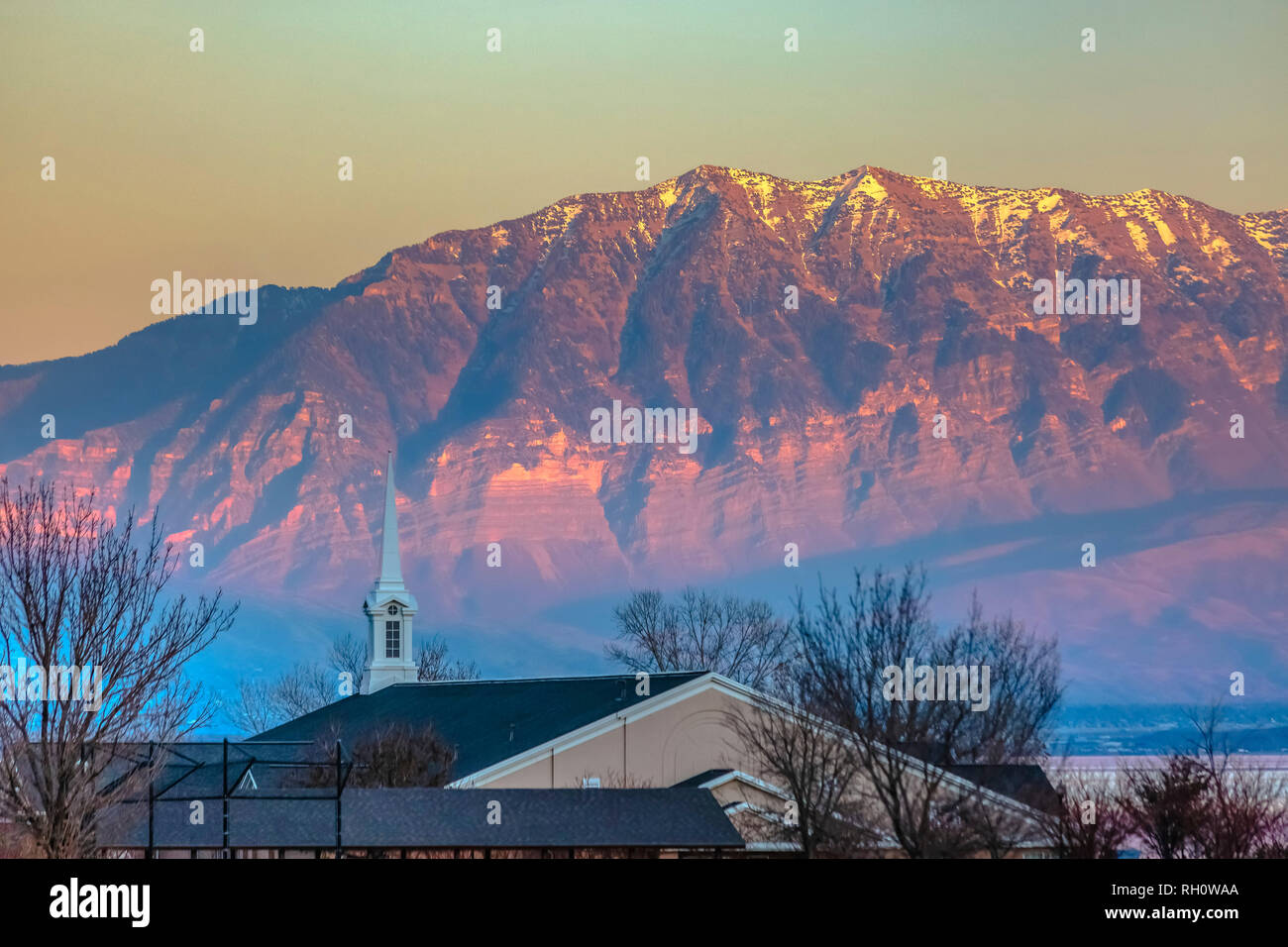 Church steeple against Mount Timpanogos in Utah Stock Photo