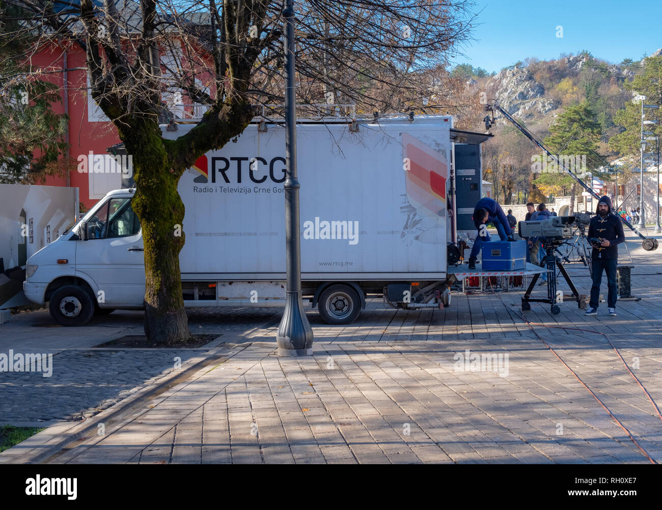 Truck and camera crew from Radio i televizija Crne Gora (radio and television Montenegro) packing up after shooting morning show on location Stock Photo