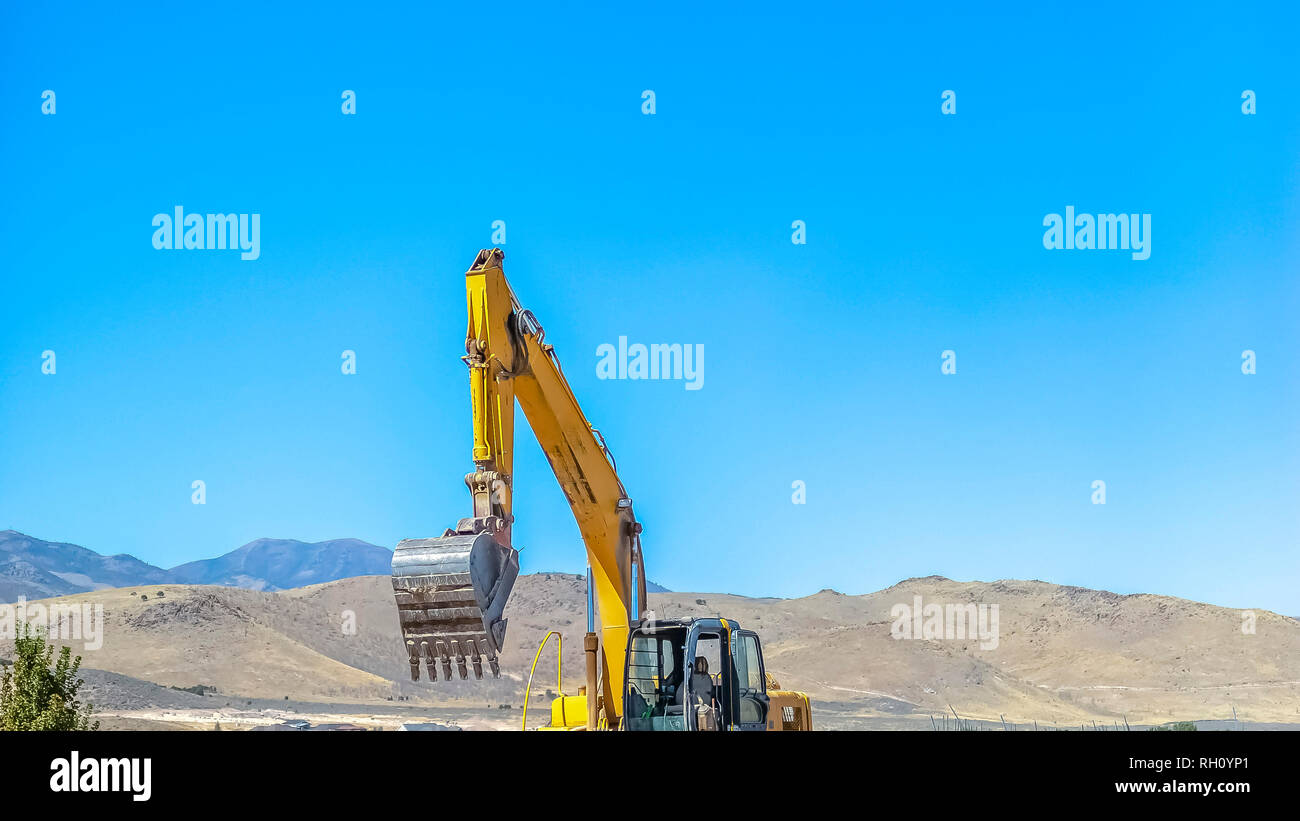 Construction site in Eagle Mountain with excavator Stock Photo - Alamy