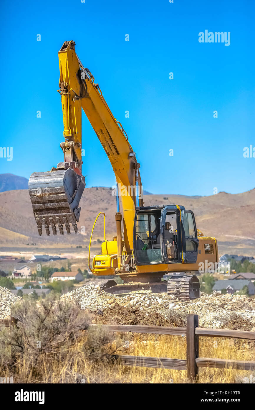 Excavator on a construction in Eagle Mountain Utah Stock Photo - Alamy