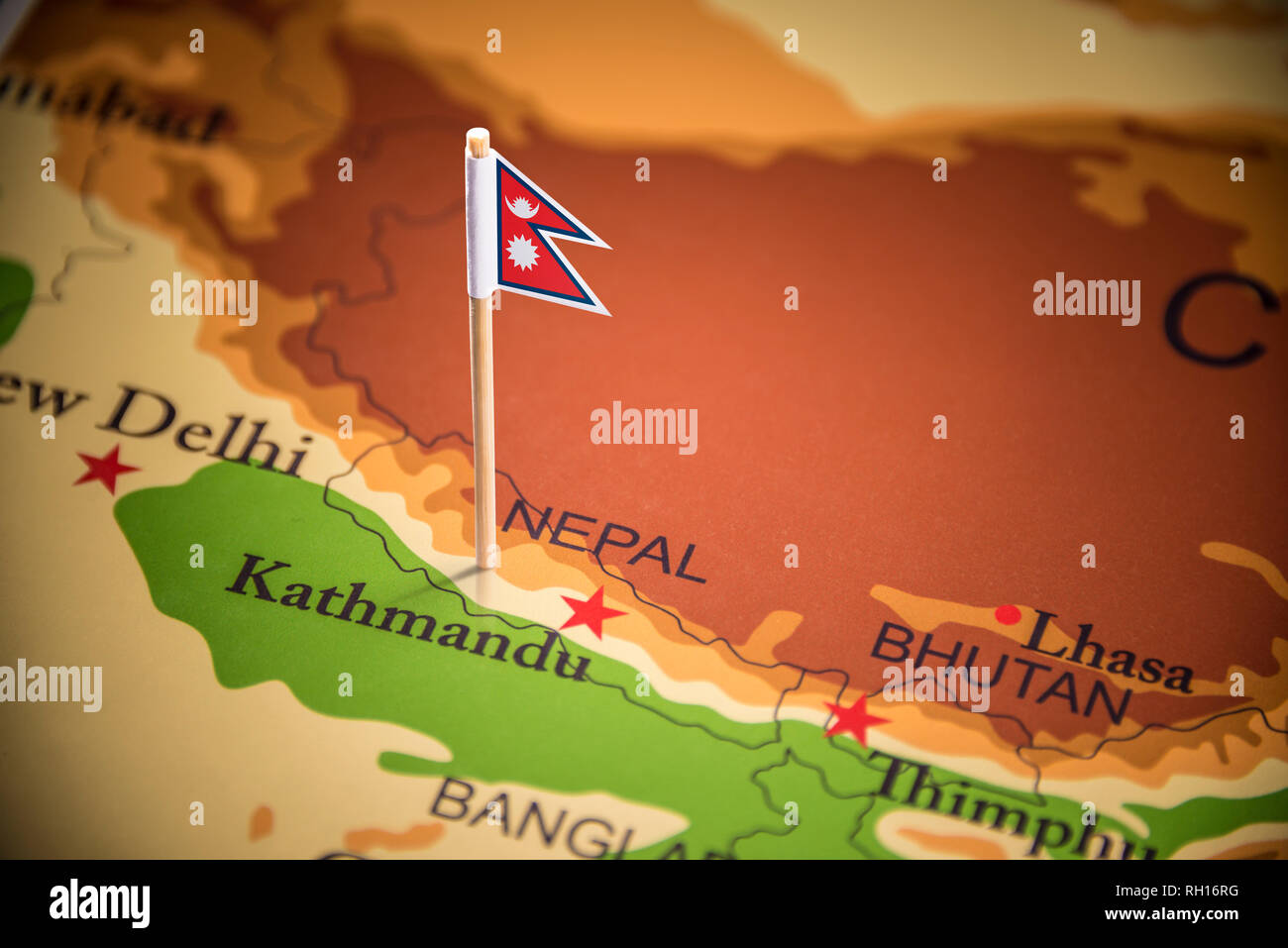 Nepal marked with a flag on the map Stock Photo Alamy