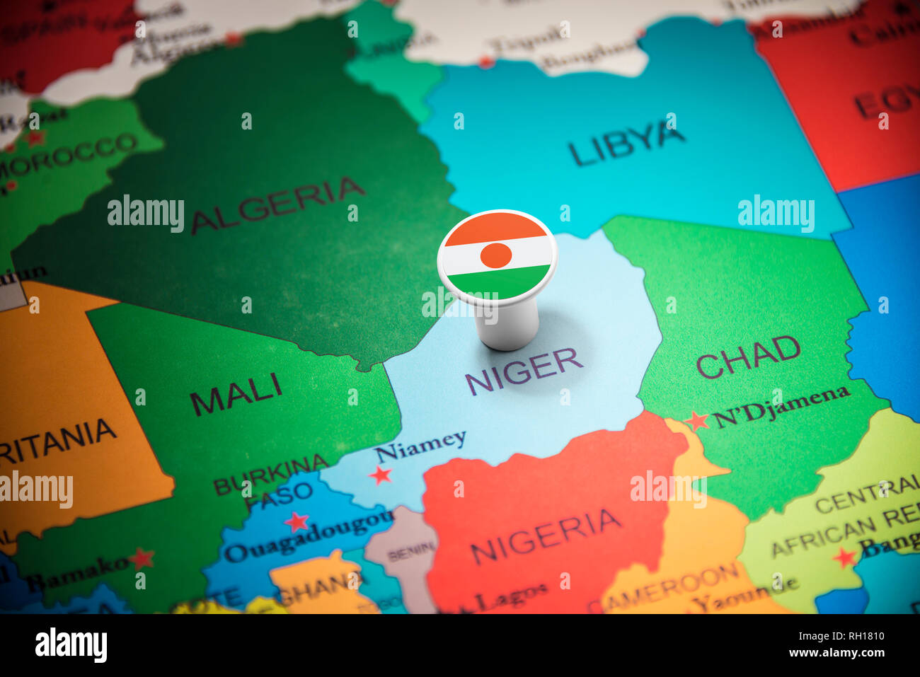 Niger marked with a flag on the map Stock Photo