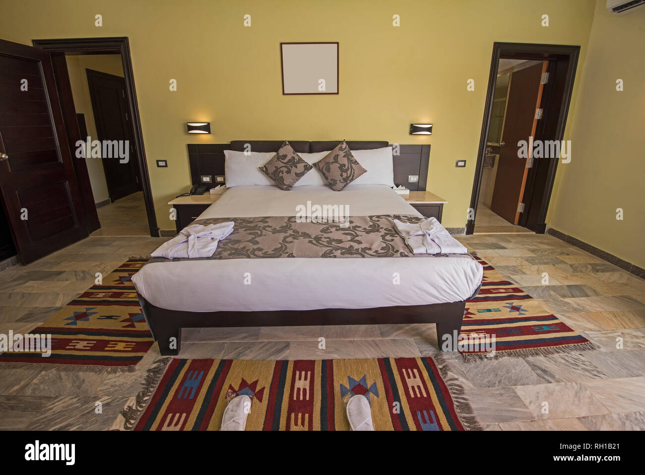View of Double bed in suite of a luxury hotel room with en suite bathroom Stock ...