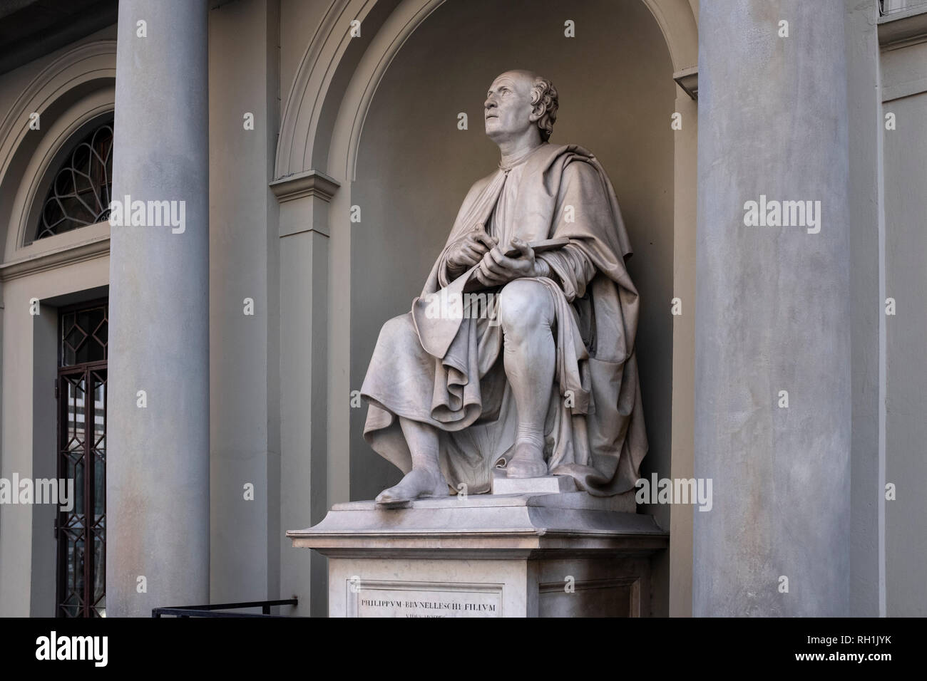 Statue of Filippo Brunelleschi Looking up at the Duomo Florence Cathedral Stock Photo