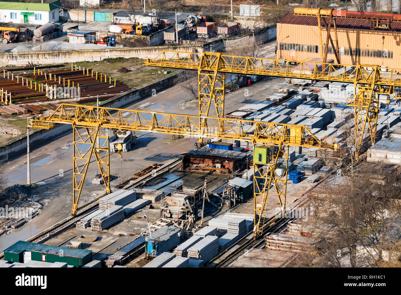 Industrial zone of a city near a river with building equipment Stock