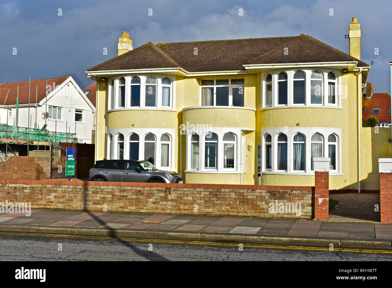 Double fronted with bay windows private house overlooking the sea at