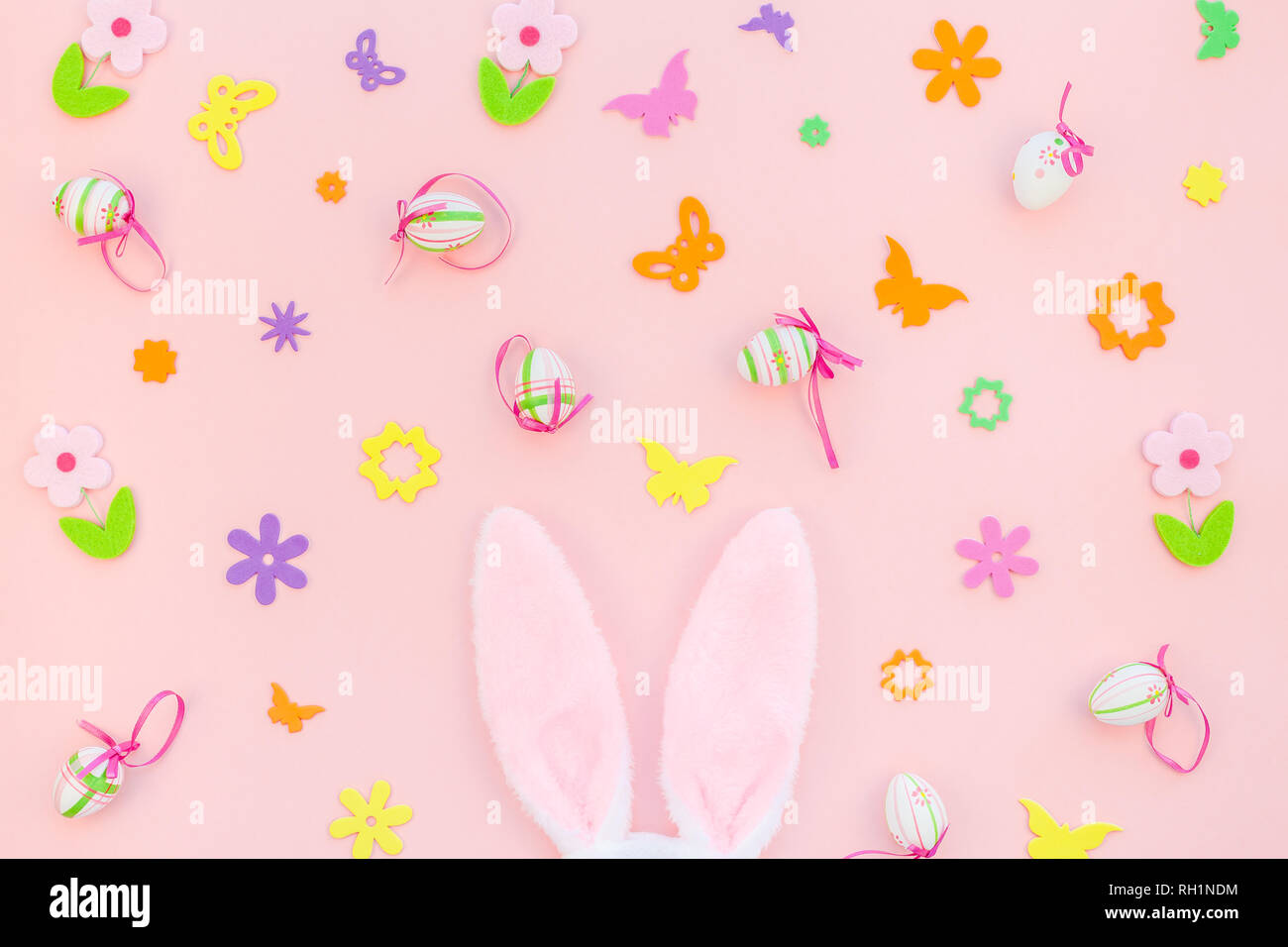 Creative Top view flat lay holiday composition Easter eggs bunny ears ...