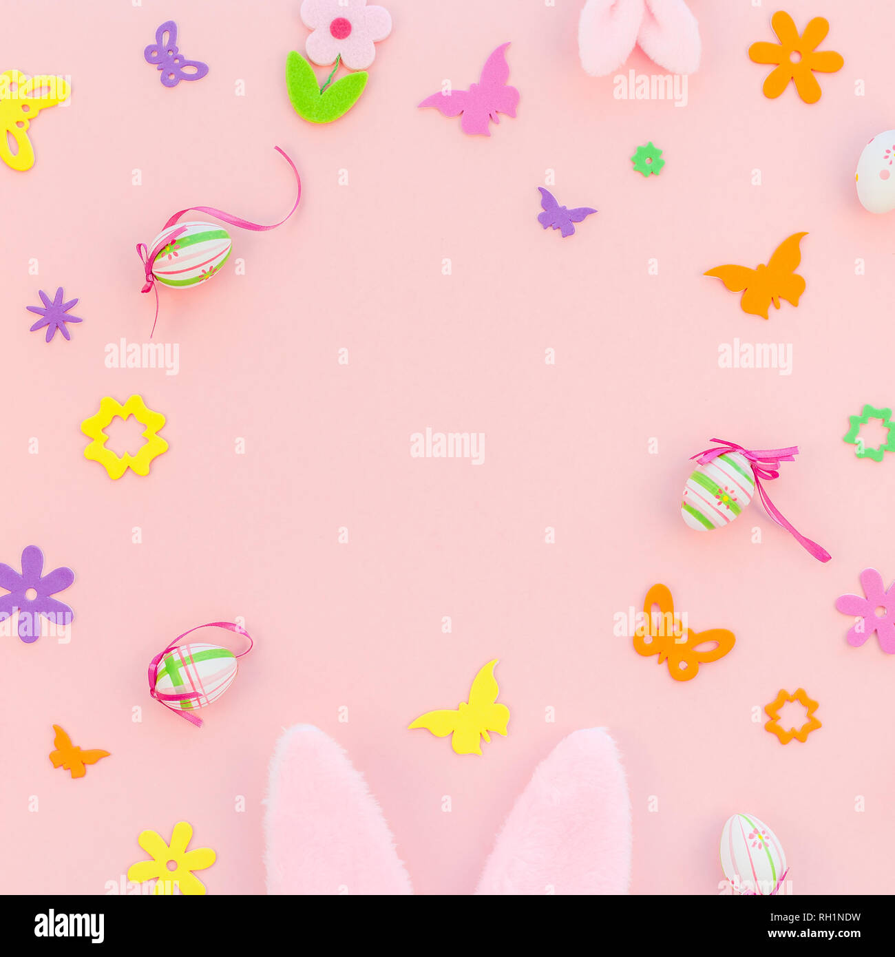 Creative Top view flat lay holiday composition Easter eggs bunny ears ...