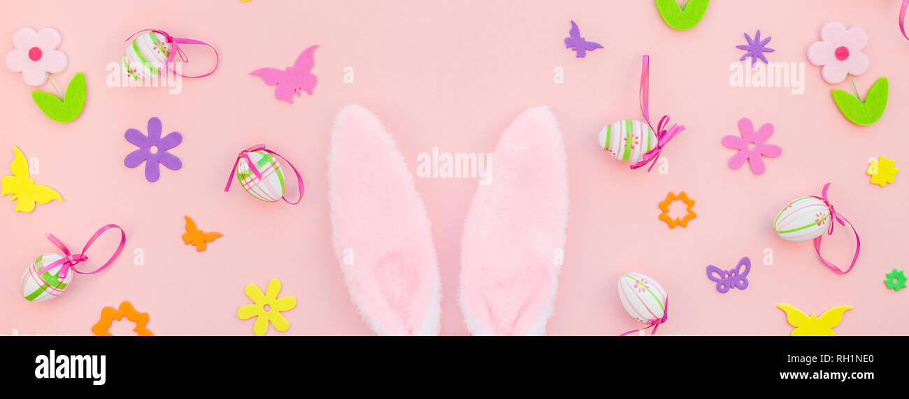 Creative Top view flat lay holiday composition Easter eggs bunny ears ...