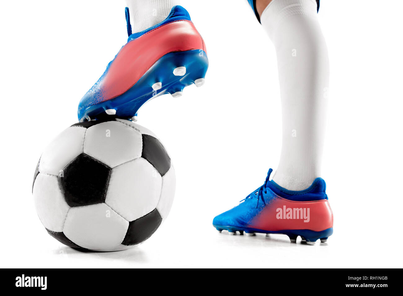 The Legs Of Soccer Player Close Up Isolated On White Young Boy With Soccer Ball Doing Flying Kick Football Soccer Player In Motion On Studio Background Fit Boy In Action At Game Stock The Legs Of Soccer Player Close Up Isolated On White Young Boy With Soccer Ball Doing Flying Kick Football Soccer Player In Motion On Studio Background Fit Boy In Action At Game Stock