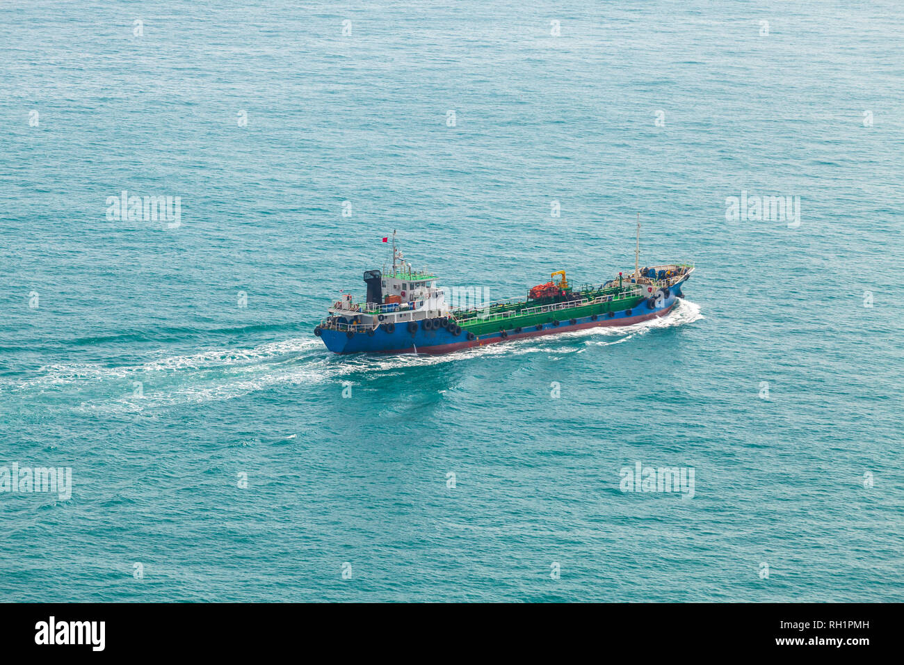 Tanker ship goes in Busan port area at sunny day, Japan Sea, South Korea Stock Photo
