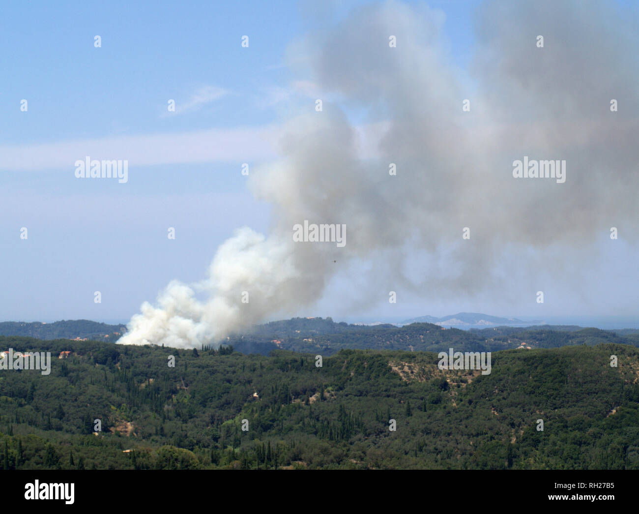 Summer wildfire near the village of Velondes, Corfu, Greece, taken from Trompeta Stock Photo
