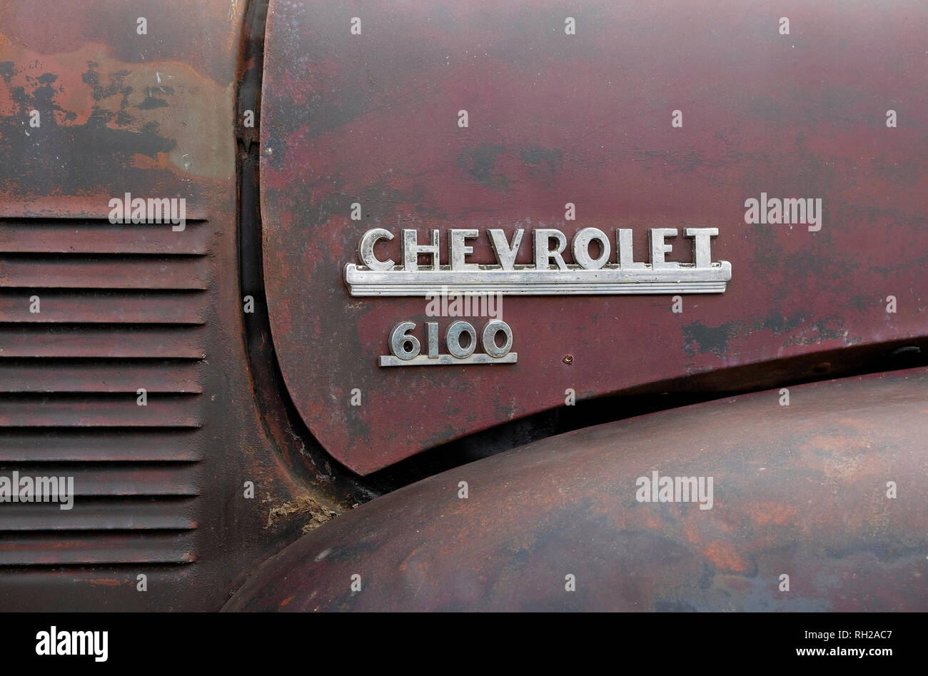 chevrolet 6100 name badge on old truck hood Stock Photo