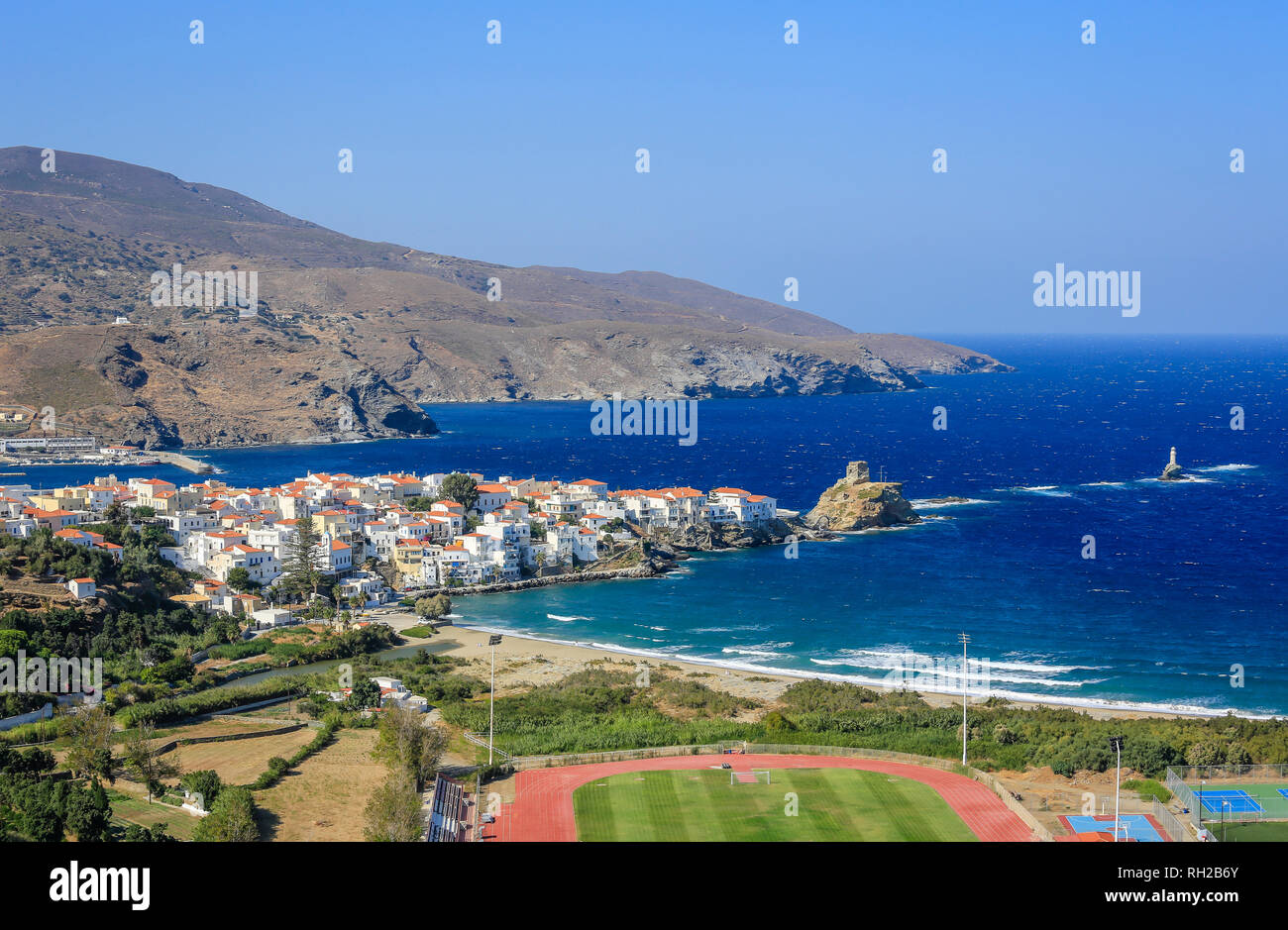 Andros City, Andros Island, Cyclades, Greece - coastal landscape with the capital Andros (Chora). Andros-Stadt, Insel Andros, Kykladen, Griechenland - Stock Photo
