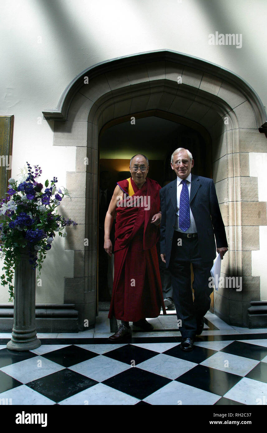 His Holiness the Dalai Lama, accompanied by George Reid MSP, the Presiding Officer of the Parliament, arrives inside the Scottish Parliament in Edinburgh where he gave a short address to politicians and members of the public. The Dalai Lama is currently paying his first visit to the United Kingdom with official engagements and events in a number of cities. He leaves on 3rd June. Stock Photo