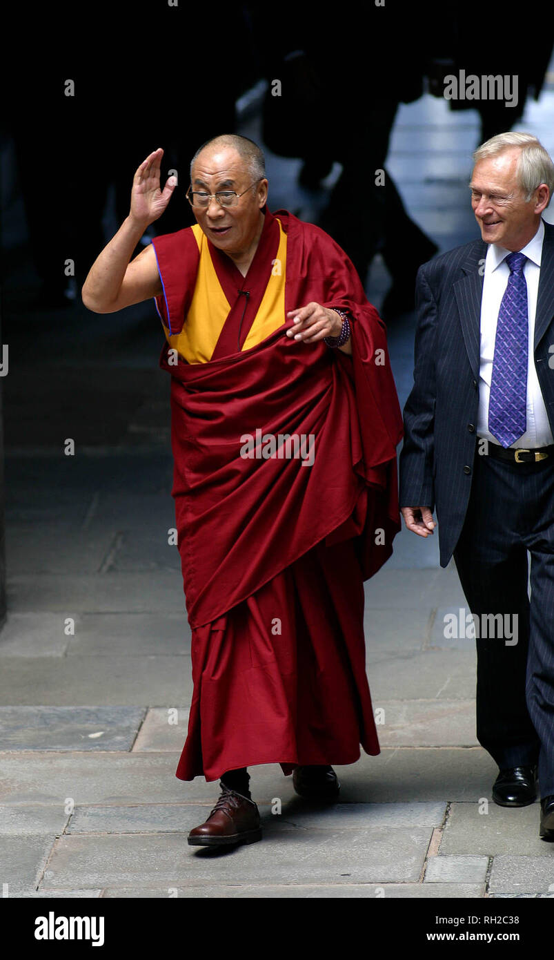 His Holiness the Dalai Lama, accompanied by George Reid MSP, the Presiding Officer of the Parliament, arrives at the Scottish Parliament in Edinburgh where he gave a short address to politicians and members of the public. The Dalai Lama is currently paying his first visit to the United Kingdom with official engagements and events in a number of cities. He leaves on 3rd June. Stock Photo
