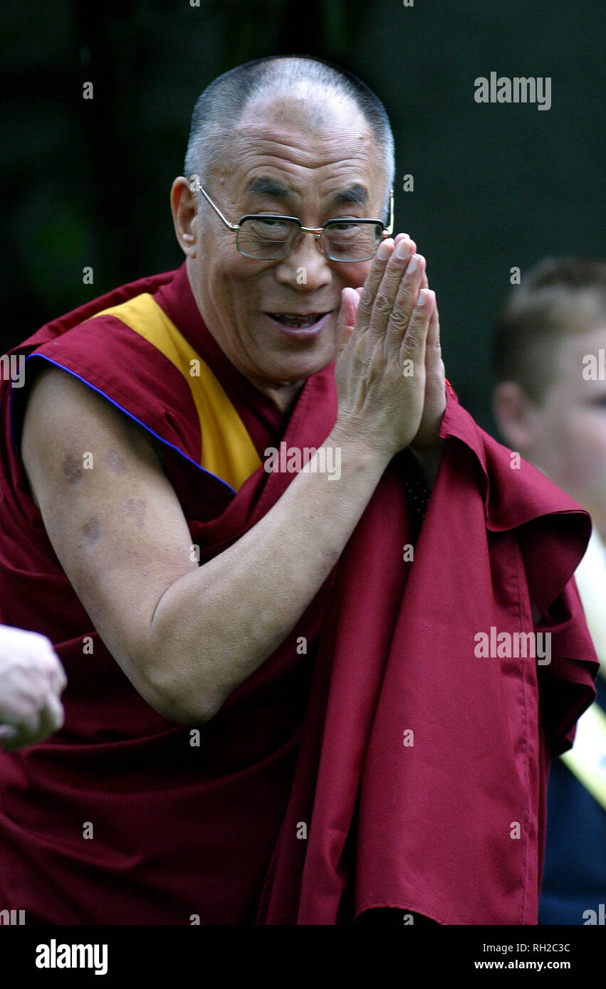 His Holiness the Dalai Lama pictured blessing the crowds at a special ceremony in Pittencrieff Park, Dunfermline during his week-long visit to the United Kingdom, his first for five years, which ends today. Stock Photo