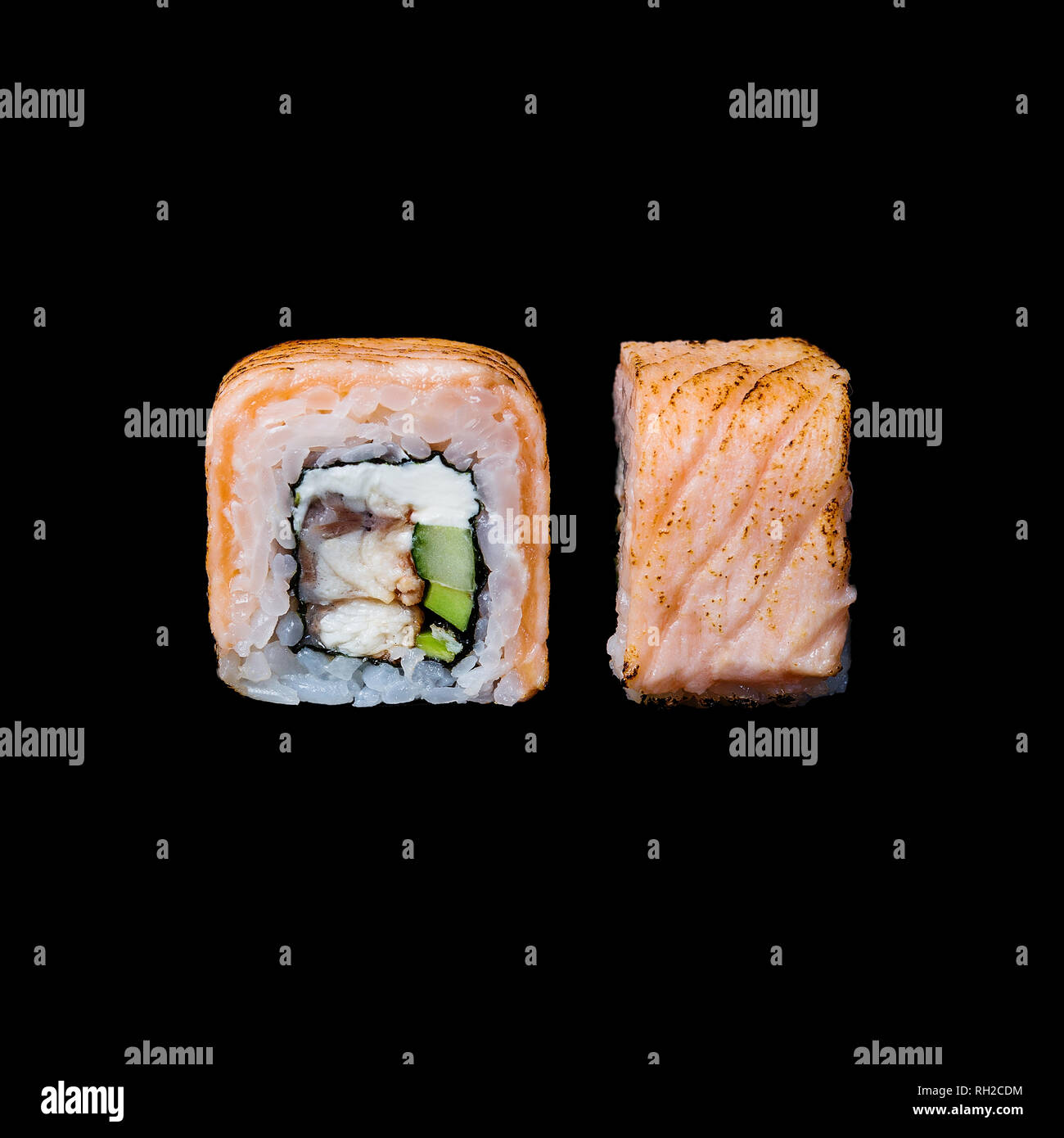 Sushi. Roll with eel, cucumber and cream cheese, isolated in black background Stock Photo