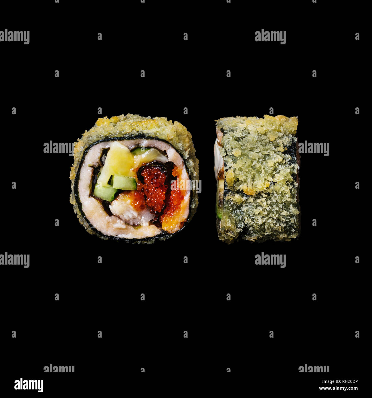 Sushi. Roll with eel, cucumber and tobiko, isolated in black background Stock Photo