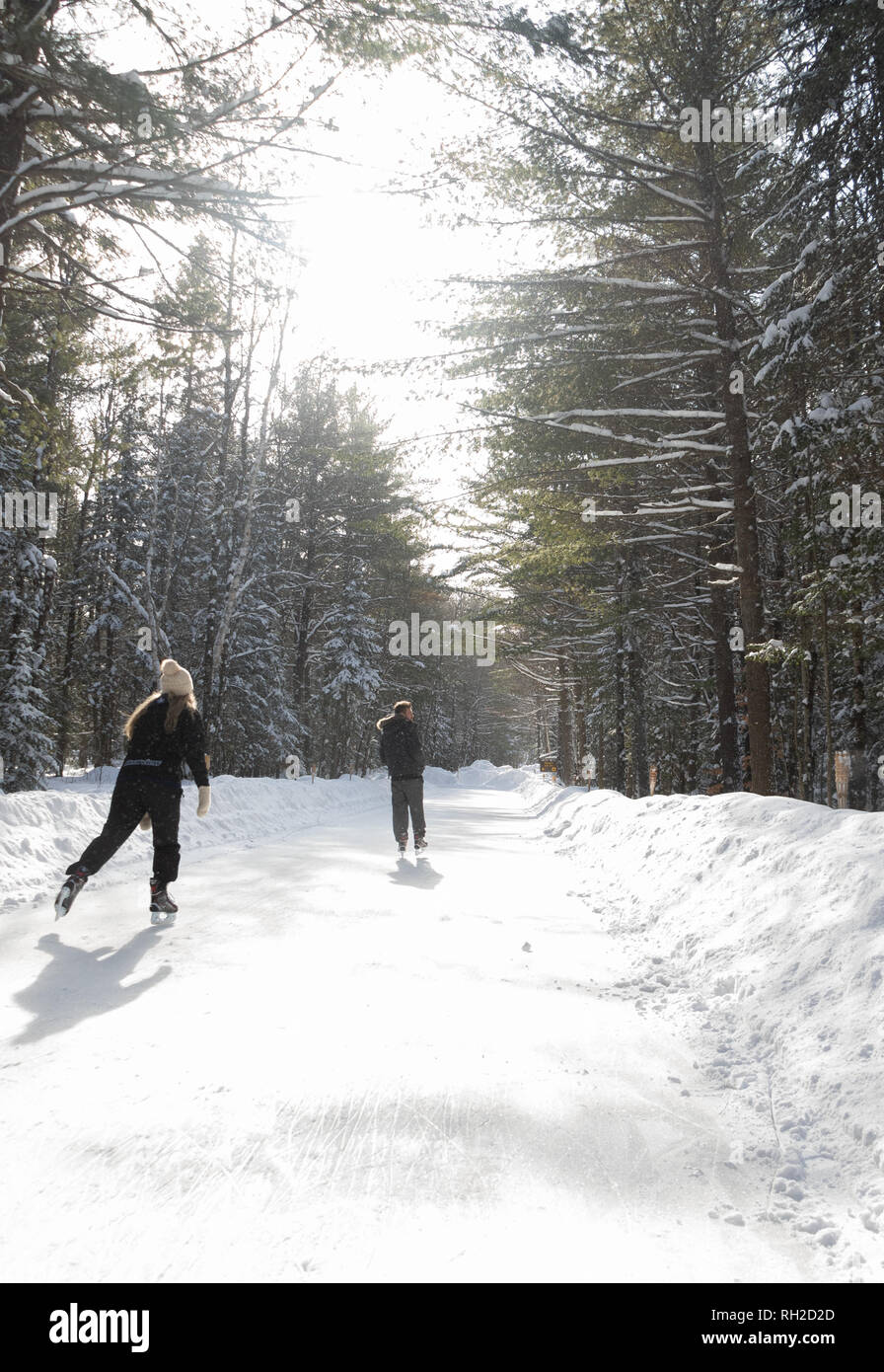 Quiet winter day skating at the outdoor forest rink. WP Stock Photo - Alamy