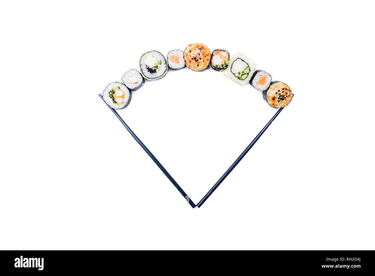 Sushi. Composition of assorted sushi rolls with chopsticks, isolated in white background Stock Photo