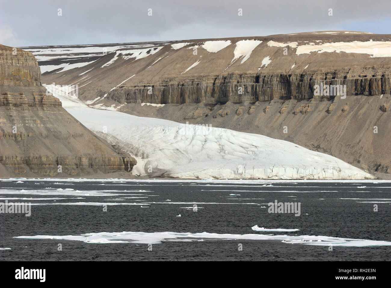 Glacier Flows From Devon Island Into Maxwell Bay, Lancaster Sound, Nunavut, Canada Stock Photo