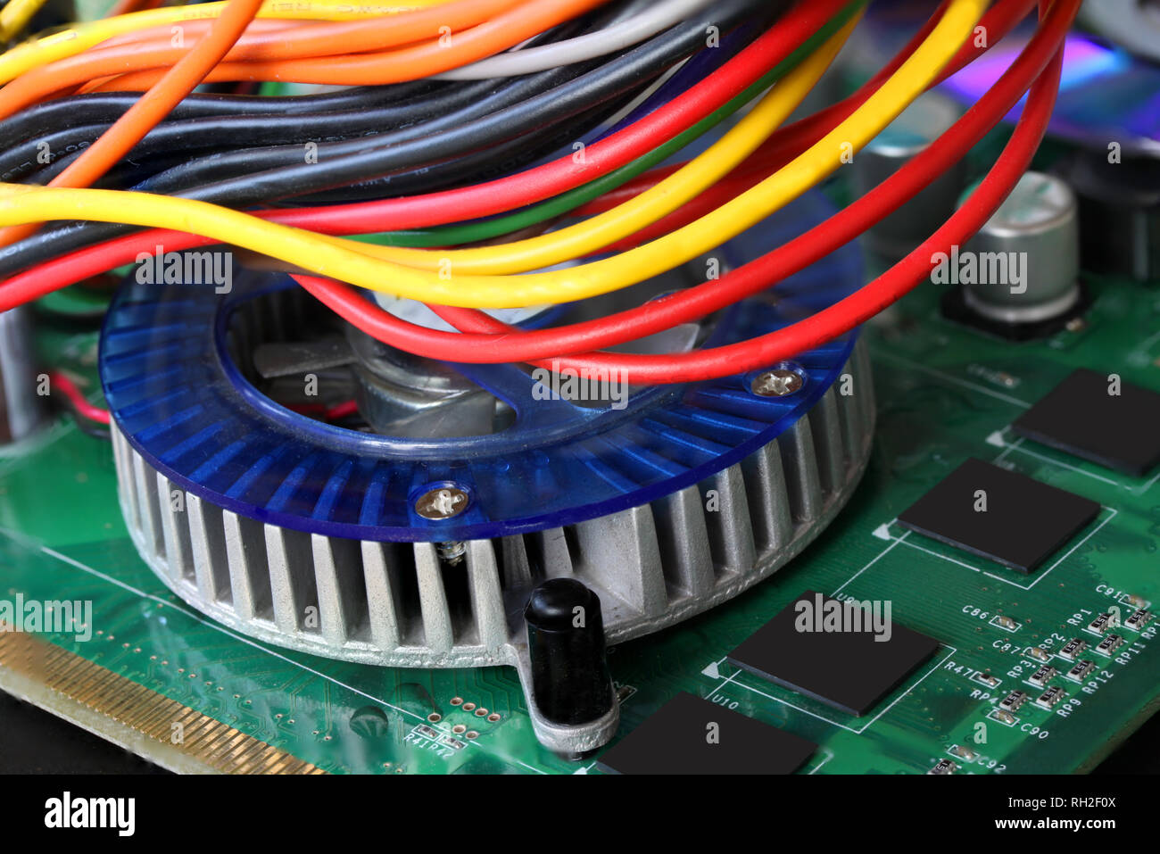 Detail of the circuits, cables and boards inside a cpu from a pc