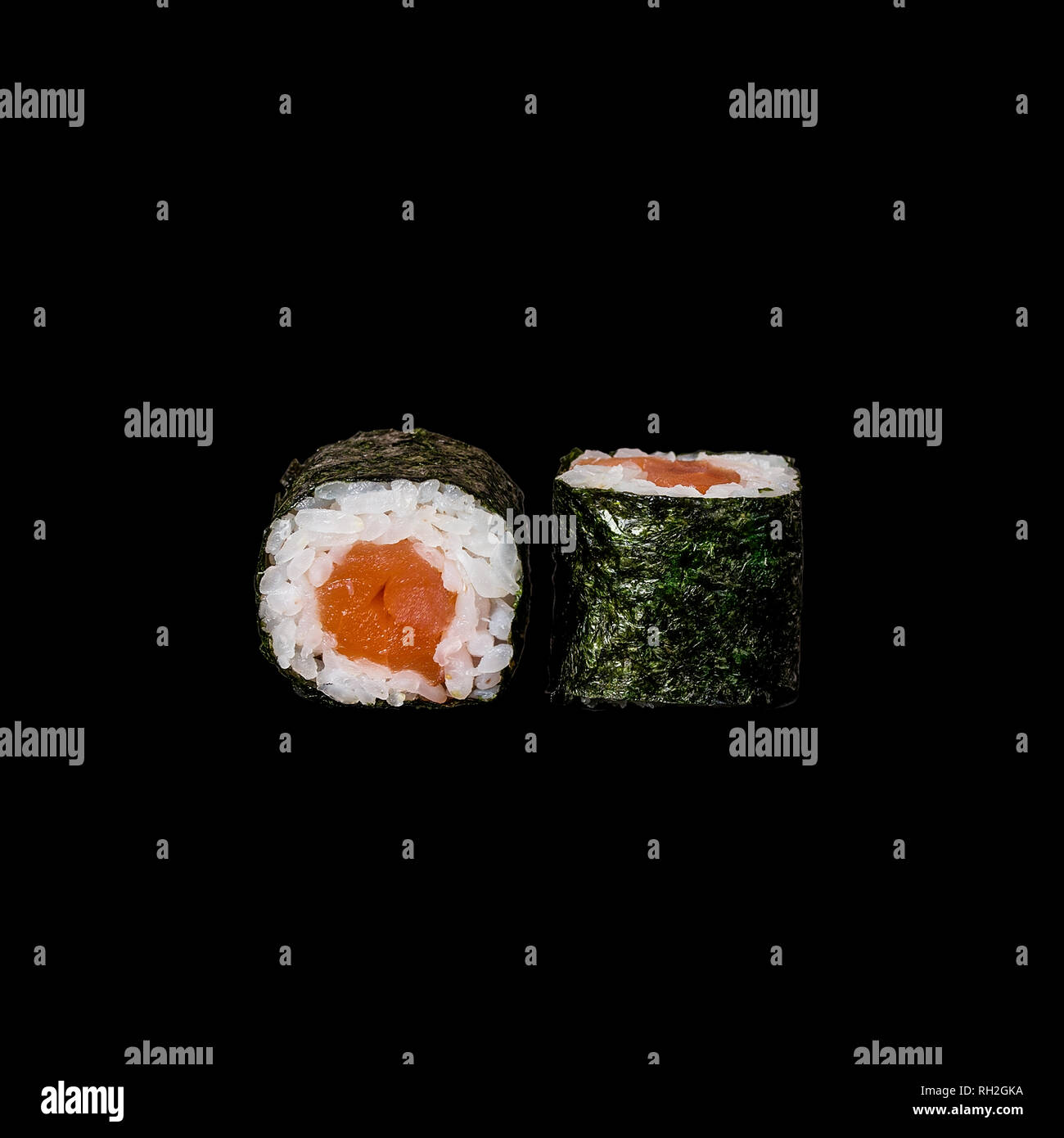 Sushi. Roll with tuna in nori leaf, isolated in black background Stock Photo