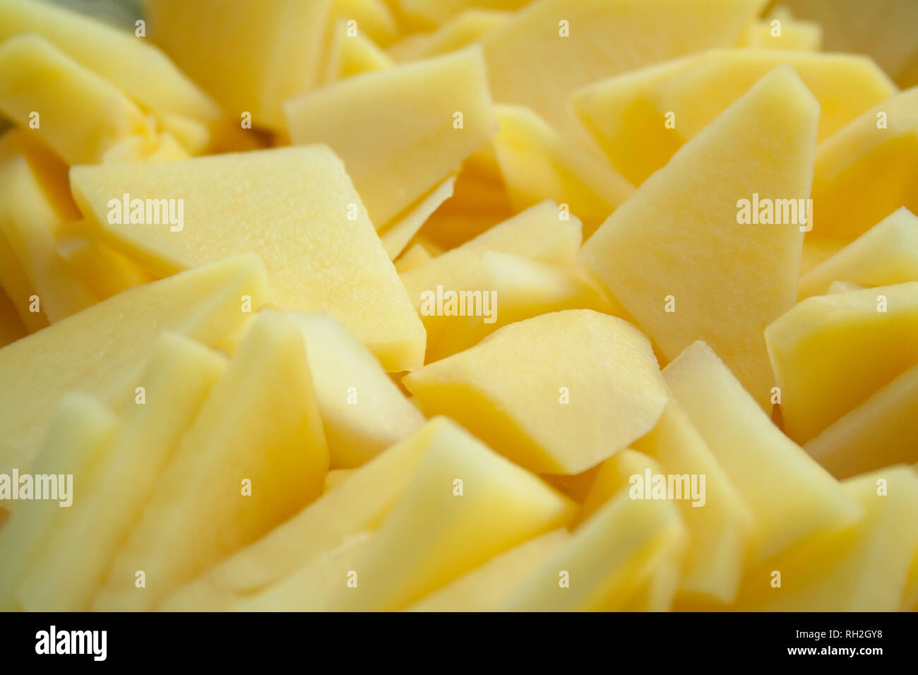 Heap of thin sliced potatoes close up Stock Photo