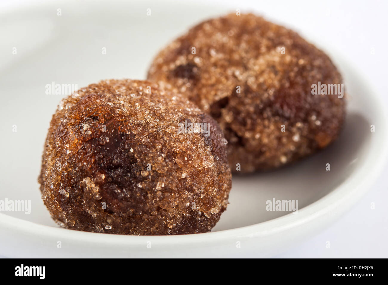 Tamarind balls a traditional sweet from Cartagena de indias on white