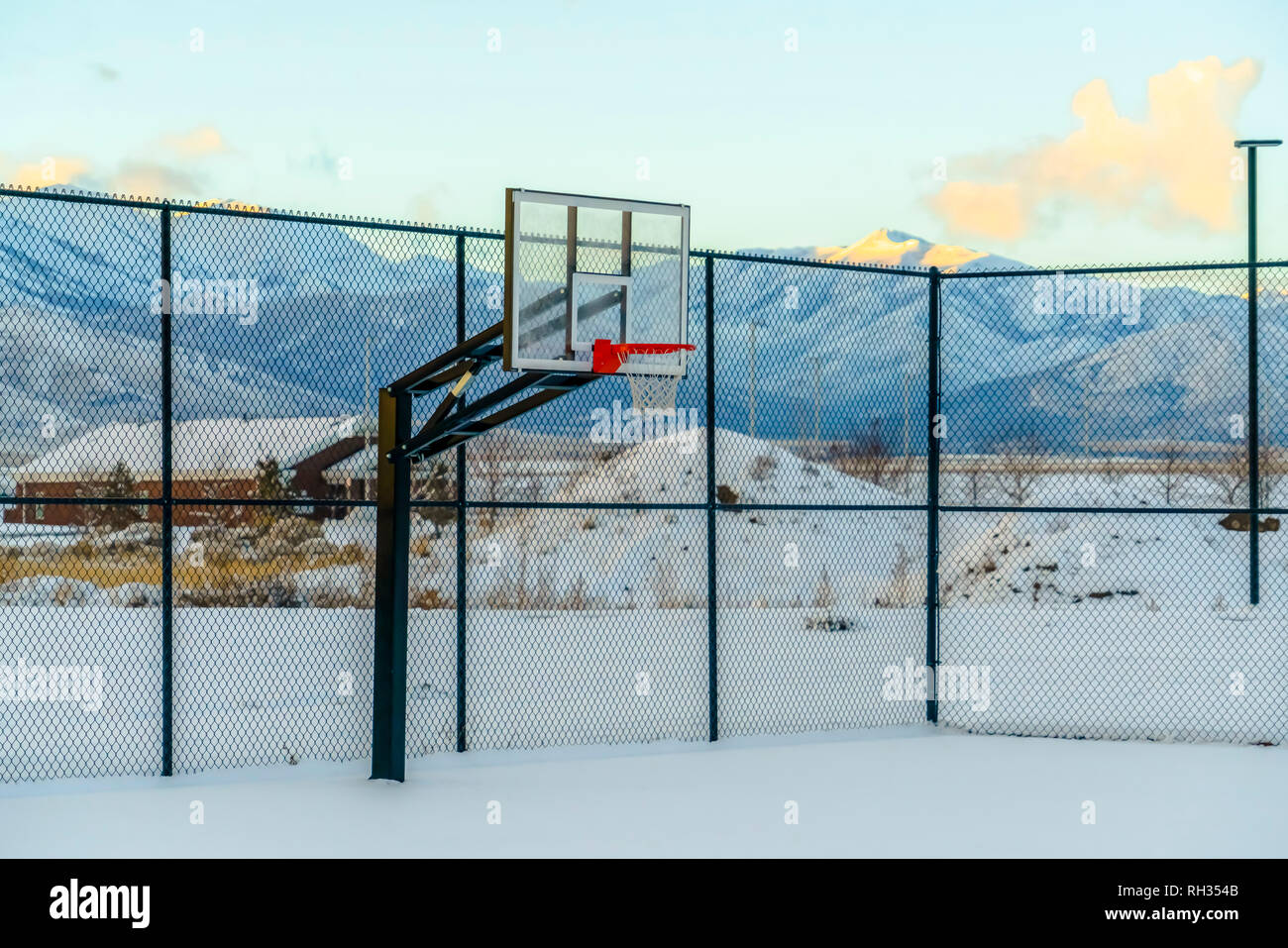 Winter scenery with basketball court and mountain Stock Photo Alamy