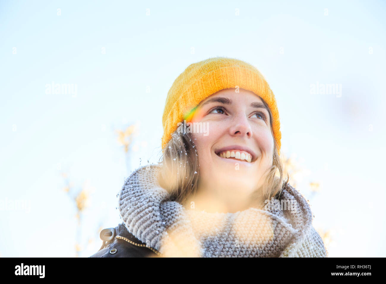 Young woman woolly hat smile hi-res stock photography and images - Alamy