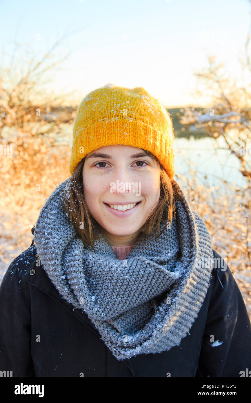 Young woman woolly hat smile hi-res stock photography and images - Alamy